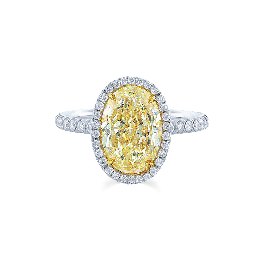 Large yellow diamond halo ring